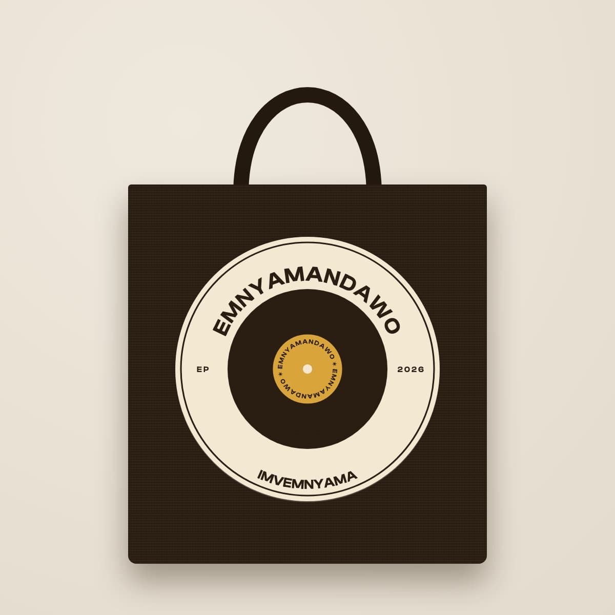 Concept mock-up: dark umber canvas tote bag with a large cream record badge reading Emnyamandawo, Imvemnyama, EP 2026